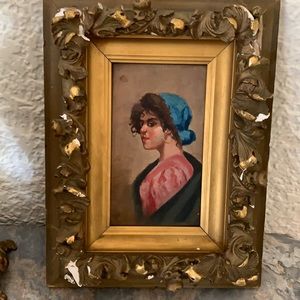 Vintage painting of a lady on wood ? Signed. Golden color Frame